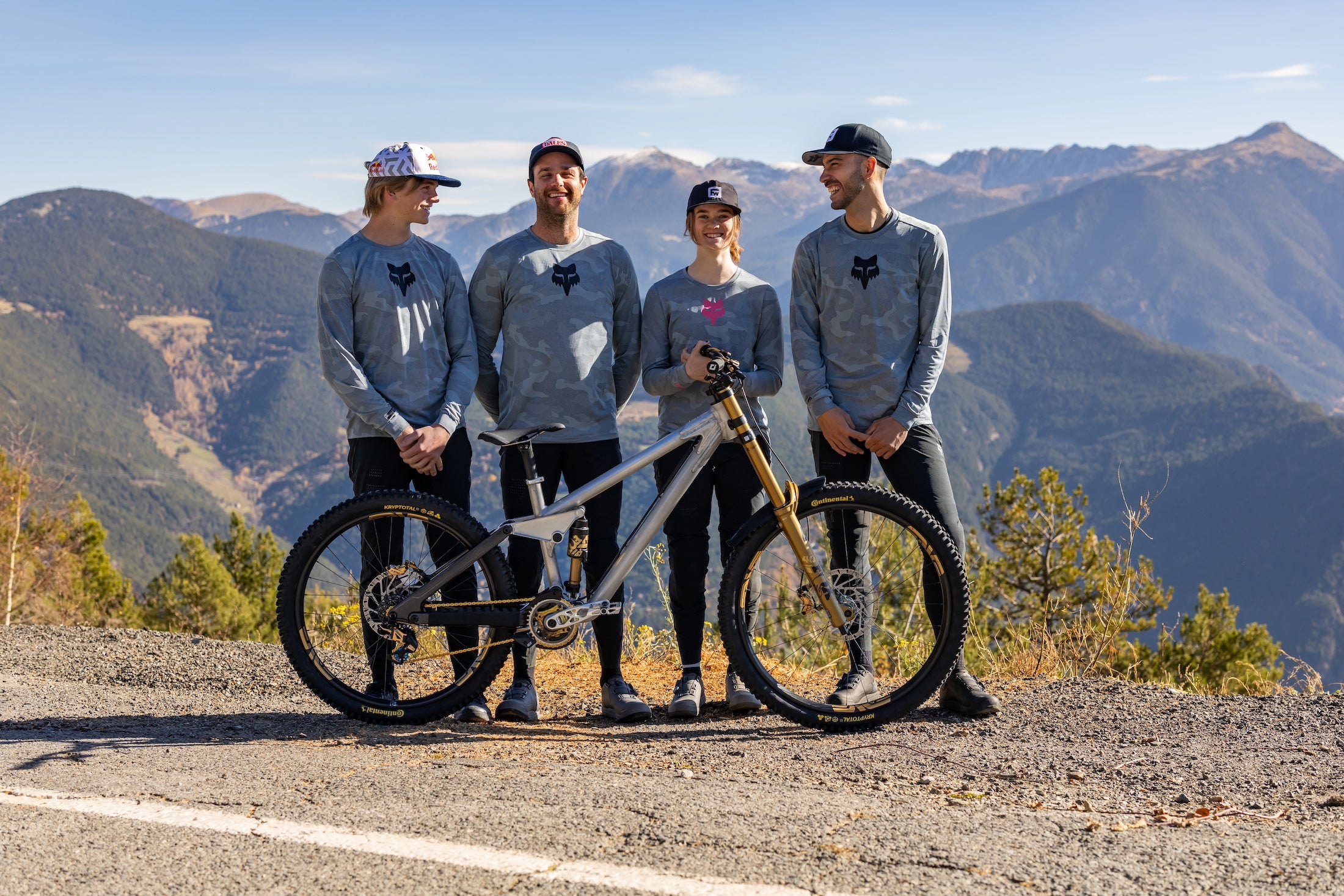 Professional mountain bike racing action featuring TRP brake systems in competitive cycling environment