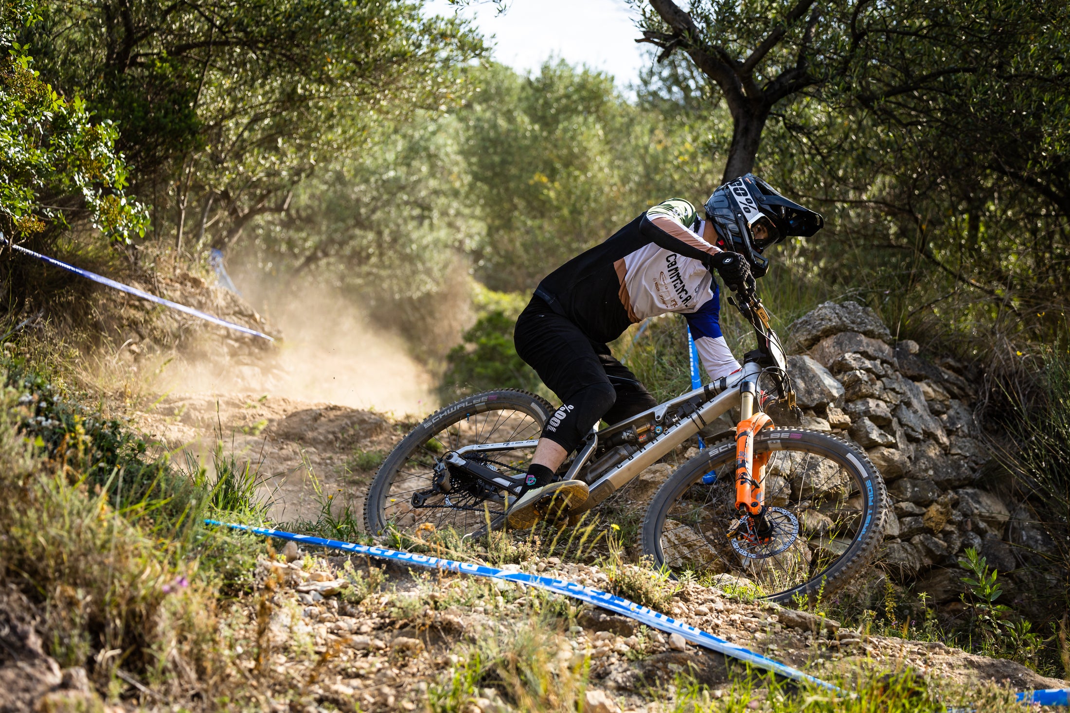 enduro rider racing at the EDR round in Pietra Ligure — supported by TRP braking components