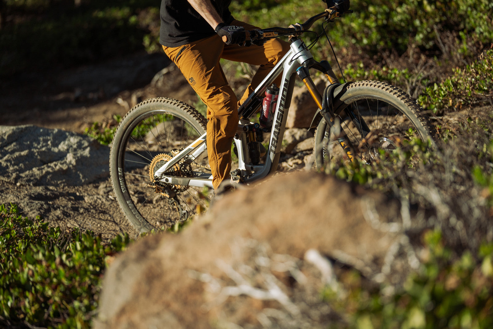 person riding an mtb out in the woods