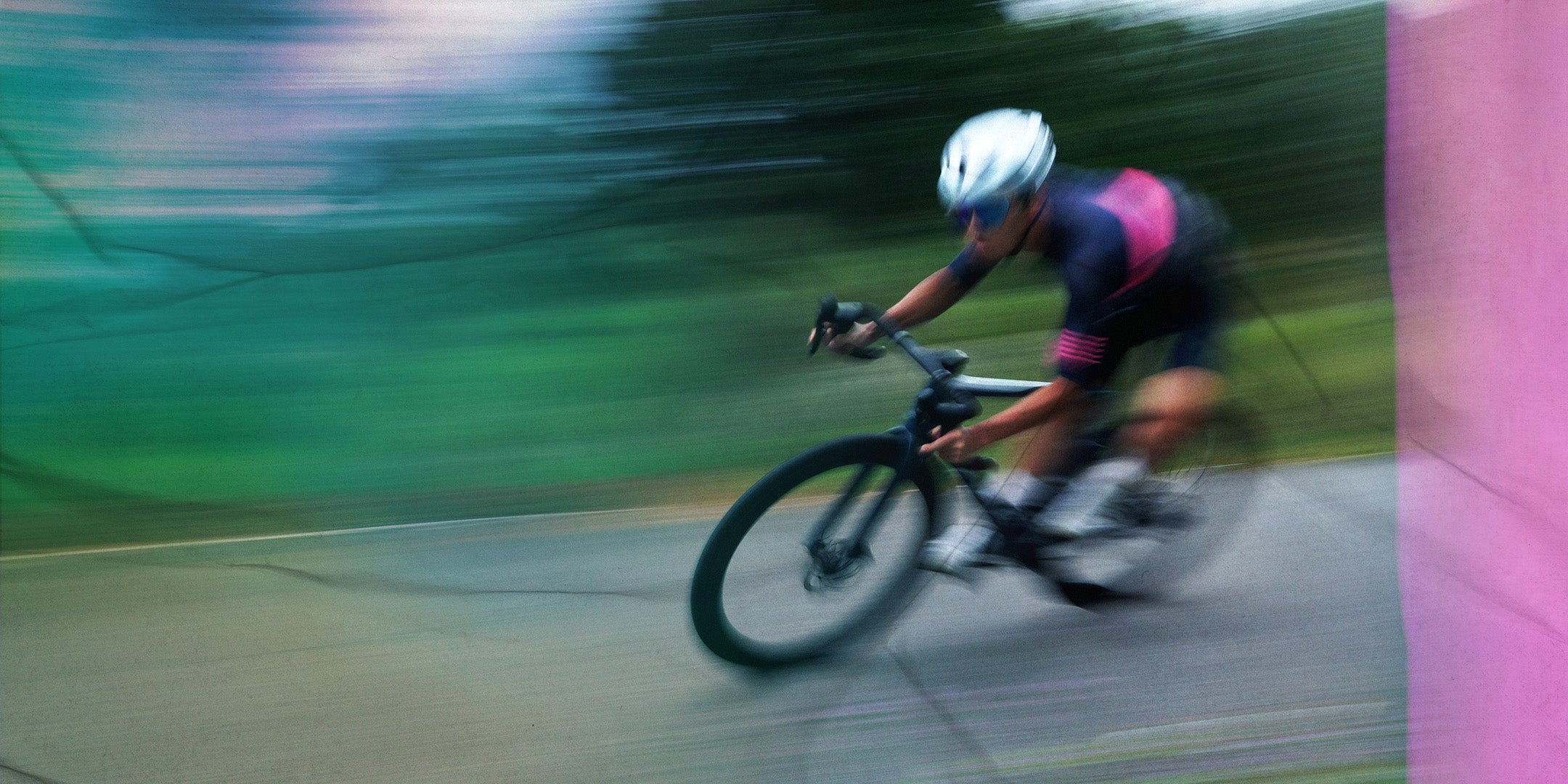 Biker in motion on a road with blurred background