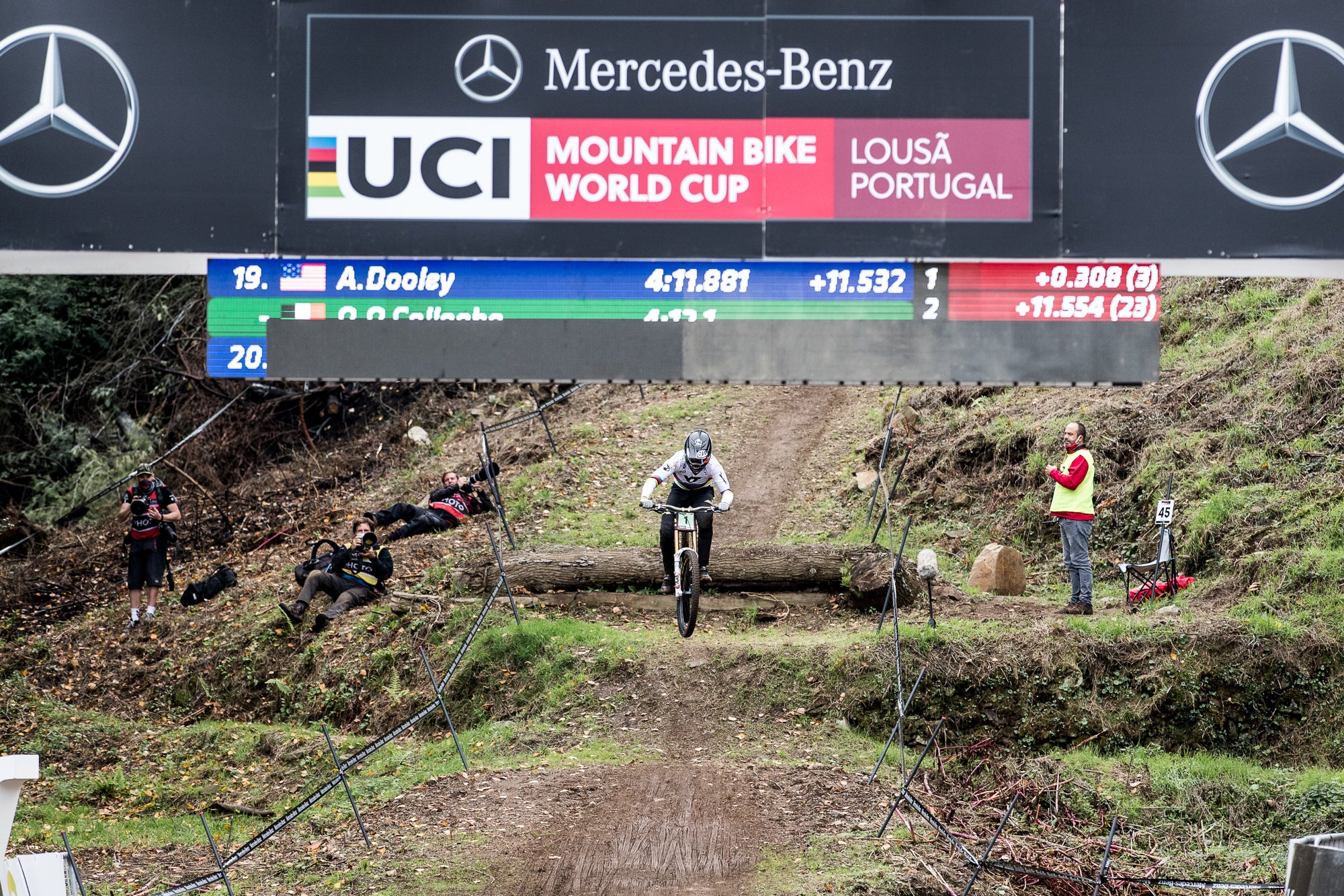 Action shot of mountain bike rider utilizing TRP brake performance on challenging terrain and steep descents